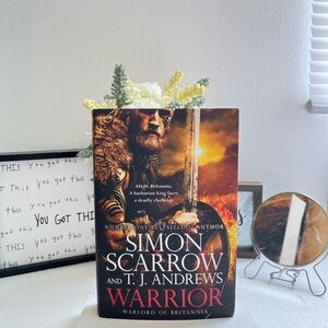 Warrior by Simon Scarrow and T.J. Andrews - Red and Black Cover Fiction Book